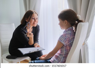 Woman Social Worker Talking To Girl. Child Psychology, Mental Health.