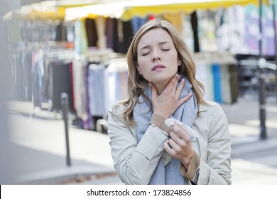 Woman With Sore Throat