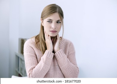 Woman With Sore Throat