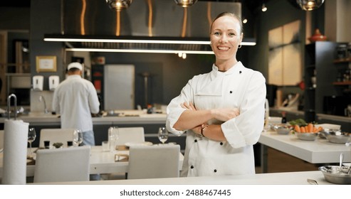 Woman, sous chef and portrait in kitchen or restaurant, happy and smile in food business with confidence. Culinary skills, hospitality industry and professional gastronomy, cook and service staff