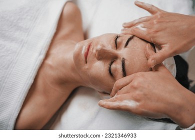 Woman in spa salon getting face massage treatment. Girl facial treatment. Skin care. Body care. - Powered by Shutterstock