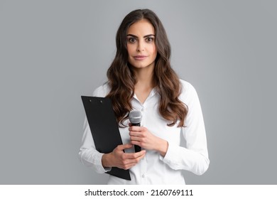 Woman Speech, Business Woman Holding A Microphone. Microphone Speech Speaking Concept. Young Beautiful Woman Singing Song Using Microphone.