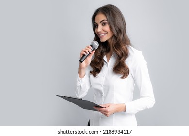 Woman Speech, Business Woman Holding A Microphone. Microphone Speech Speaking Concept. Young Beautiful Woman Singing Song Using Microphone.