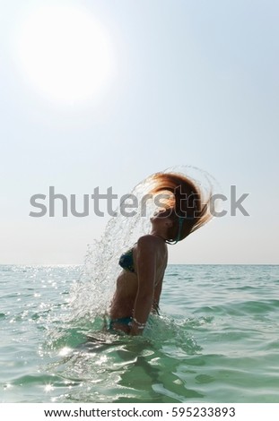 Similar – Image, Stock Photo leg Woman Beach Ocean