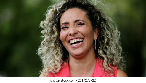 Woman spontaneous laugh, person burst laughing out loud, real life smile - Shutterstock ID 2017278722