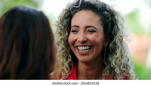 Woman Spontaneous Laugh And Smile Talking To Friend