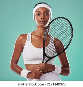 Woman sport tennis player and athlete feeling strong with female empowerment and motivation. Portrait of a fit, serious and young athletic indian lady looking motivated, determined and confident - Powered by Shutterstock