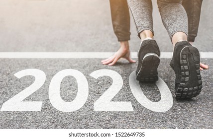 Woman in sports uniform running around. Healthy way of life, an infused figure. sneakers close-up, finish 2019 Start to new year 2020, plans, goals, objectives