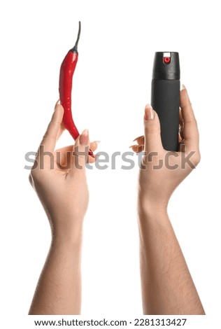 Woman with spray and chili pepper on white background