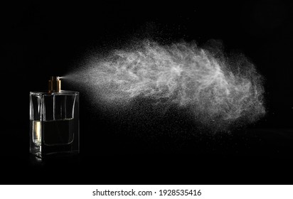 Woman Spraying Luxury Perfume On Black Background, Closeup