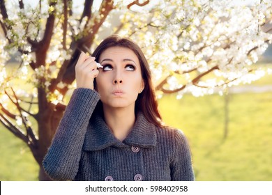 Woman With Spring Allergies Using Eye Drops - Cute Girl Suffering From An Ophthalmological Allergic Reaction To Pollen
