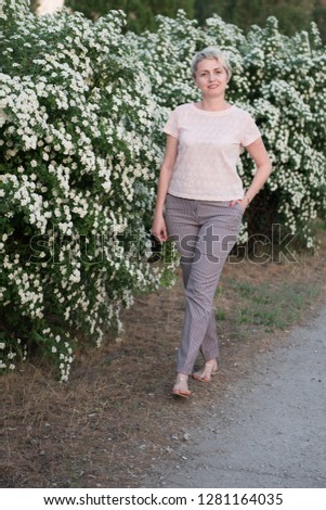 Similar – junge, hübsche Frau, Hut, Brille, grün, Sommer