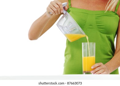 Woman Squeezes Juice By Juicer