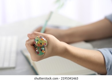 Woman Squeezing Colorful Slime, Closeup. Antistress Toy