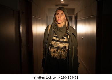 Woman Stalker Walking In A Polluted Post Apocalyptic Abandoned Building With Smog: Environmental Disaster And Apocalypse Concept