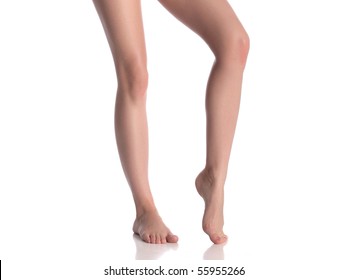 Woman Standing Bare Foot On Tip Of Toe