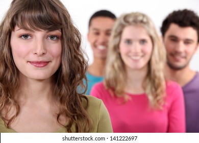 Woman Standing In Front Of Her Peer Group