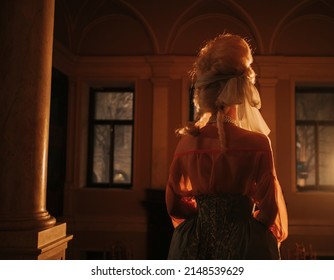 Woman Standing In A Wig In Baroque Palace