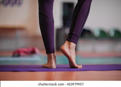 Woman Standing At Yoga Class