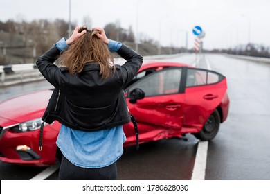 Woman Stands Near A Broken Car After An Accident. Call For Help. Car Insurance