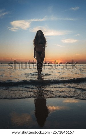 Similar – Image, Stock Photo Woman standing in shallow water with bare legs talking to her dog