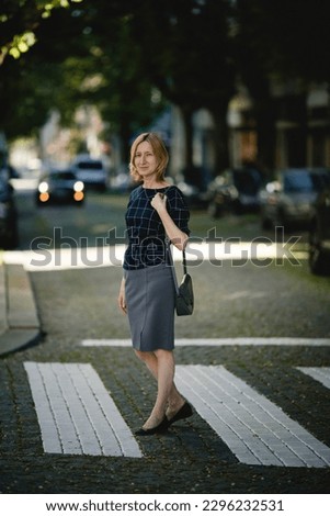 Similar – Attractive blond woman leaving her workplace