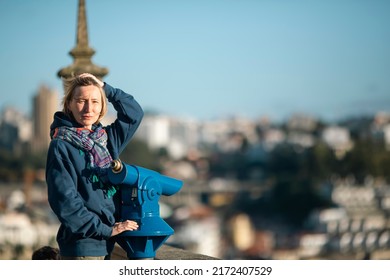 A Woman Stands On A Vantage Point In The Old City.