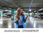 A woman stands in a parking lot, scanning the rows of cars, searching for hers amidst the sea of vehicles.