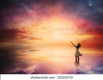 Woman Stands In Praise Before A Beautiful Night Sky.