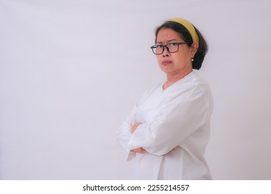 A woman stared with an angry expression. - Shutterstock ID 2255214557