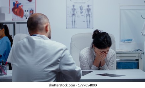 Woman Starts Crying At Doctor After Hearing Bad News About Her Or Other Dear Person Health. Bad News About Terminal Patient. Cancer Or Other Terminal Ill Concept