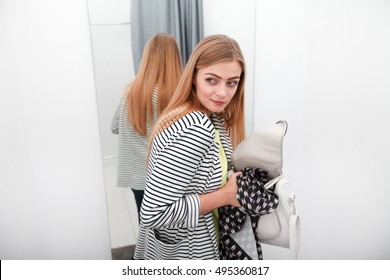 Woman stealing a dress