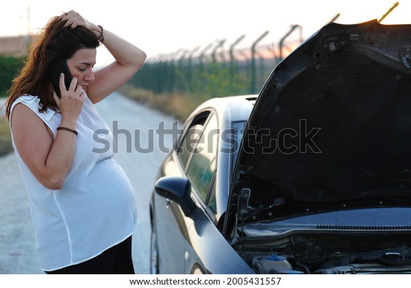 woman stepping on car\
insurance help