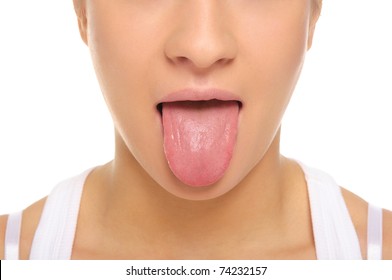 Woman stick ones tongue out isolated in white