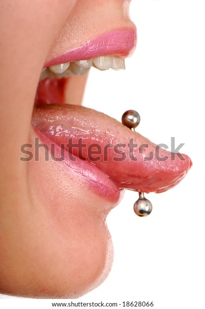 woman sticking\
out her tongue to show\
piercing