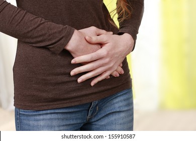 Woman With Stomach Pain