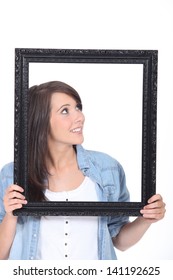 Woman Stood Holding Empty Picture Frame