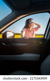 Woman Stop To Enjoy Sunset At Road Trip Car Travel