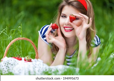 Woman With Strawberries Outdoor