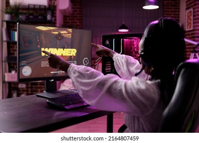 Woman Streamer Playing Video Games Tournament On Computer, Celebrating Win. Female Player Winning Action Gaming Championship, Having Fun With Online Gameplay Competition On Pc.