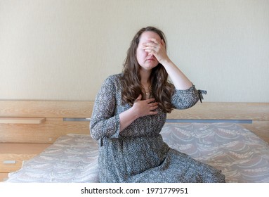 Woman Stress Alone, Sad Sitting On Bed At Home In Depression. Concept Mental Health, Emotional Anxiety, Panic Attack. Sadness, Loneliness, Old Age. Social Documentary Concepts