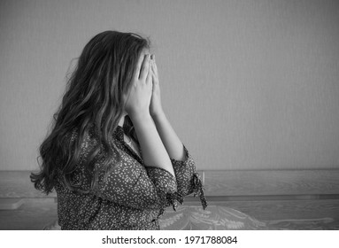 Woman Stress Alone, Sad Sitting On Bed In Depression. Concept Mental Health, Young Emotional Anxiety, Panic Attack. Sadness, Loneliness, Old Age. Social Documentary Concepts Black And White