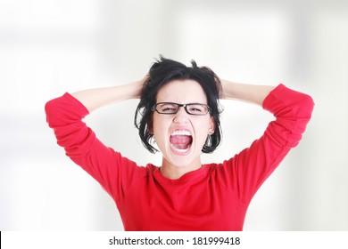 Woman Stressed Is Going Crazy Pulling Her Hair In Frustration.