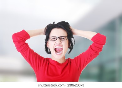 Woman Stressed Is Going Crazy Pulling Her Hair In Frustration.