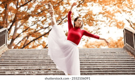 Woman, stretching and ballet dancing in city, outdoor and practice performance for autumn art. Female person, professional dancer and creative talent in Japan, rehearsal and urban town for elegance - Powered by Shutterstock