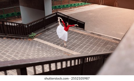 Woman, stretching and ballet movement in city, outdoor and practice performance for art. Female person, professional dancer and creative talent in Japan, rehearsal and urban town for elegant training - Powered by Shutterstock