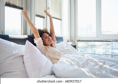 Woman Stretching Bed Her Arms Raised Stock Photo 683927017 | Shutterstock