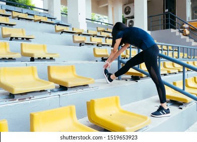 A Woman Stretching Before Her Workout.