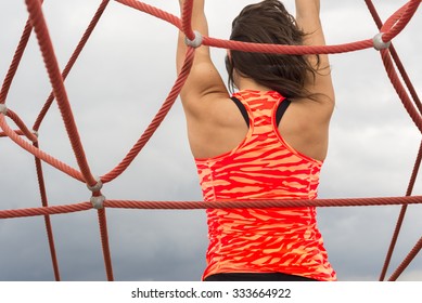 Woman stretching her strong Back on the Beach - Shutterstock ID 333664922