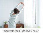 Woman stretching in the morning